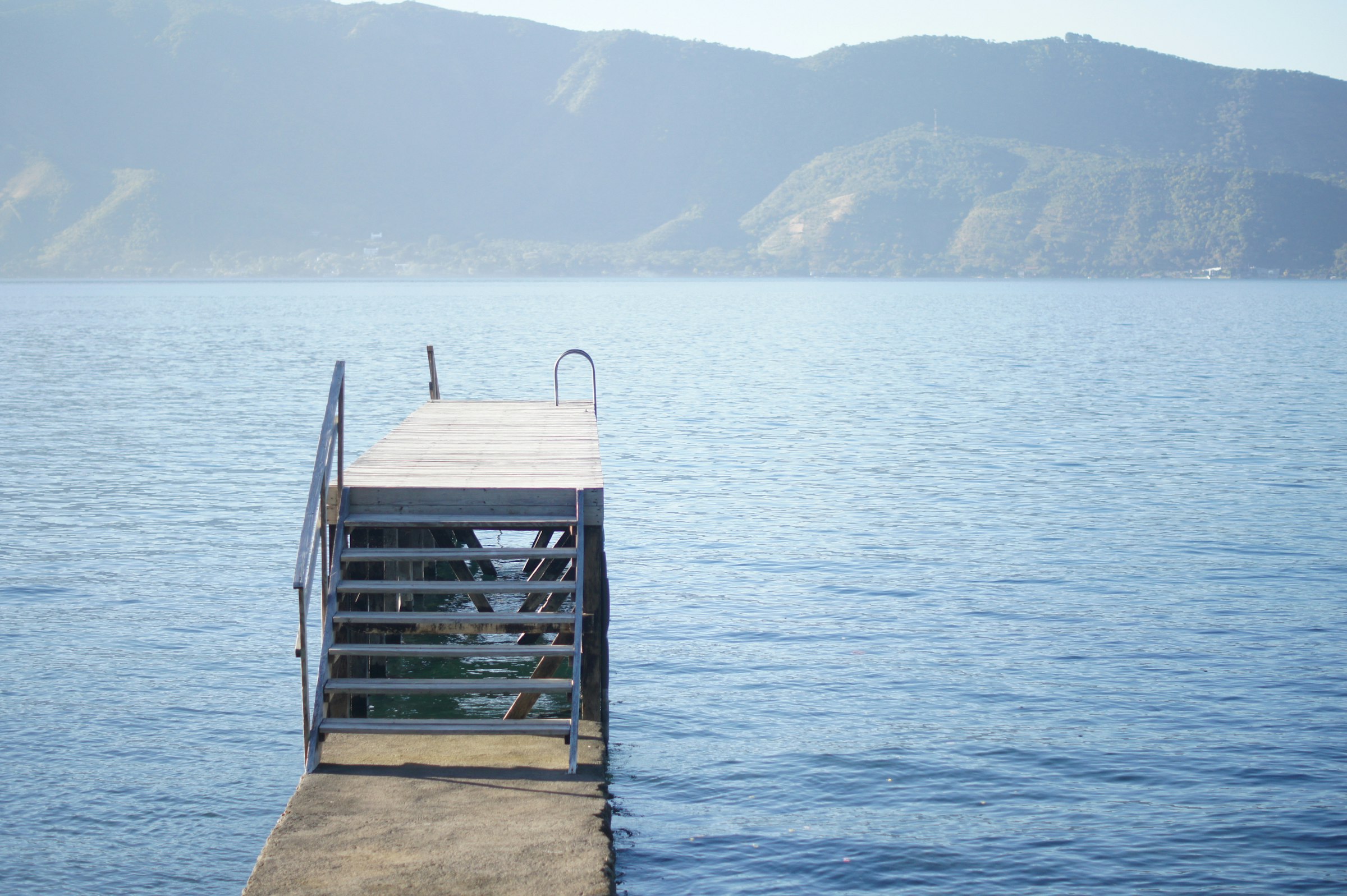A wooden dock on Lago de Coatepeque