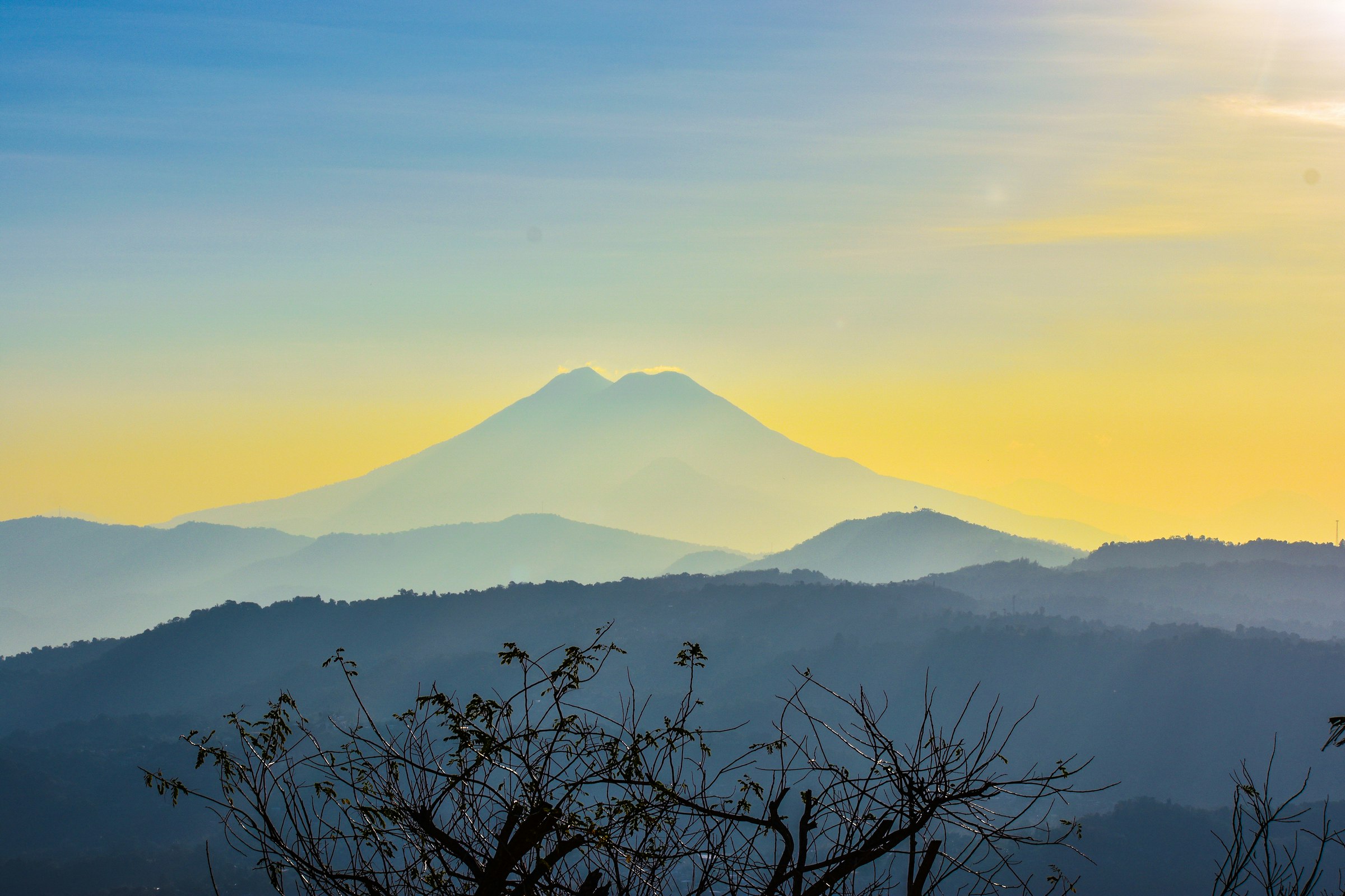 Morning light over the volcanoes, seen from Los Planes de Renderos